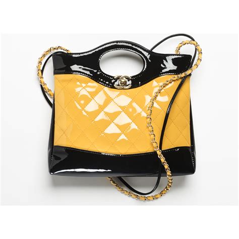 black chanel handbag with gold chain|chanel 31 mini shopping bag.